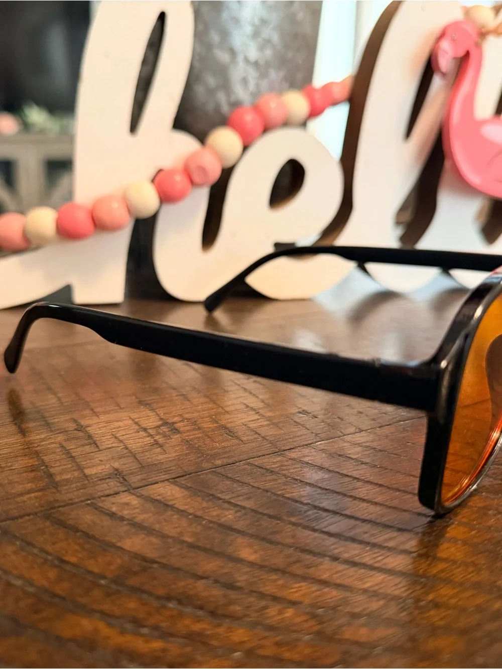 Women's Black Frame Sunglasses with Amber-Orange Lenses